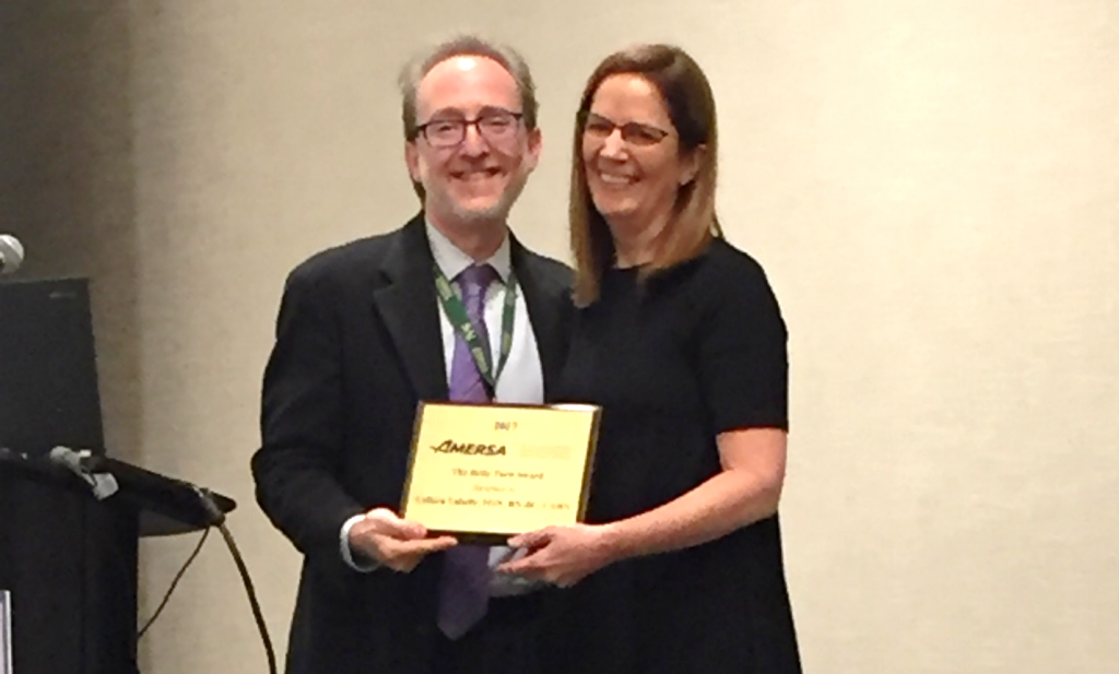 Colleen LaBelle recieving AMERSA's Betty Ford Award, presented by Boston Medical Center's Richard Saitz, MD